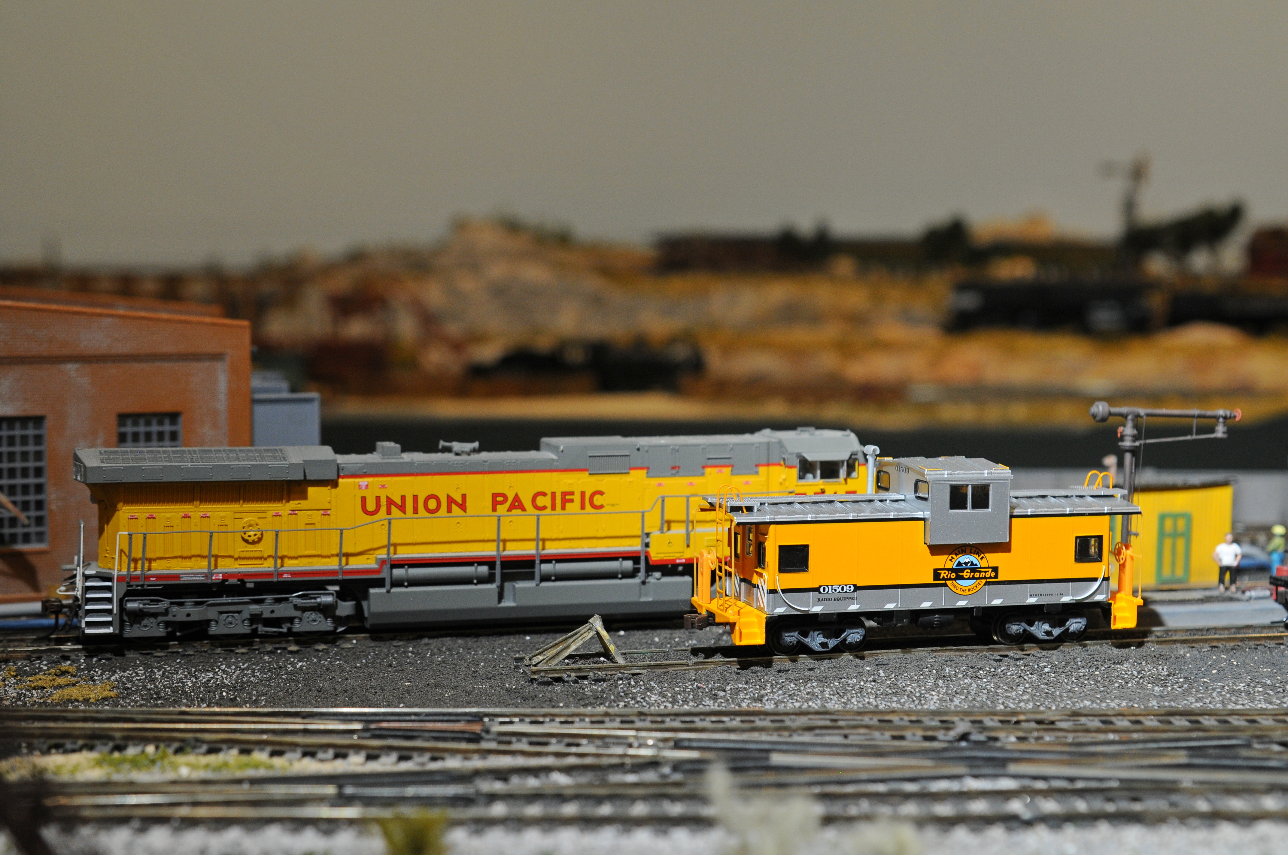 A Union Pacific GE AC6000 #7517 awaits service on the diesel fueling track.